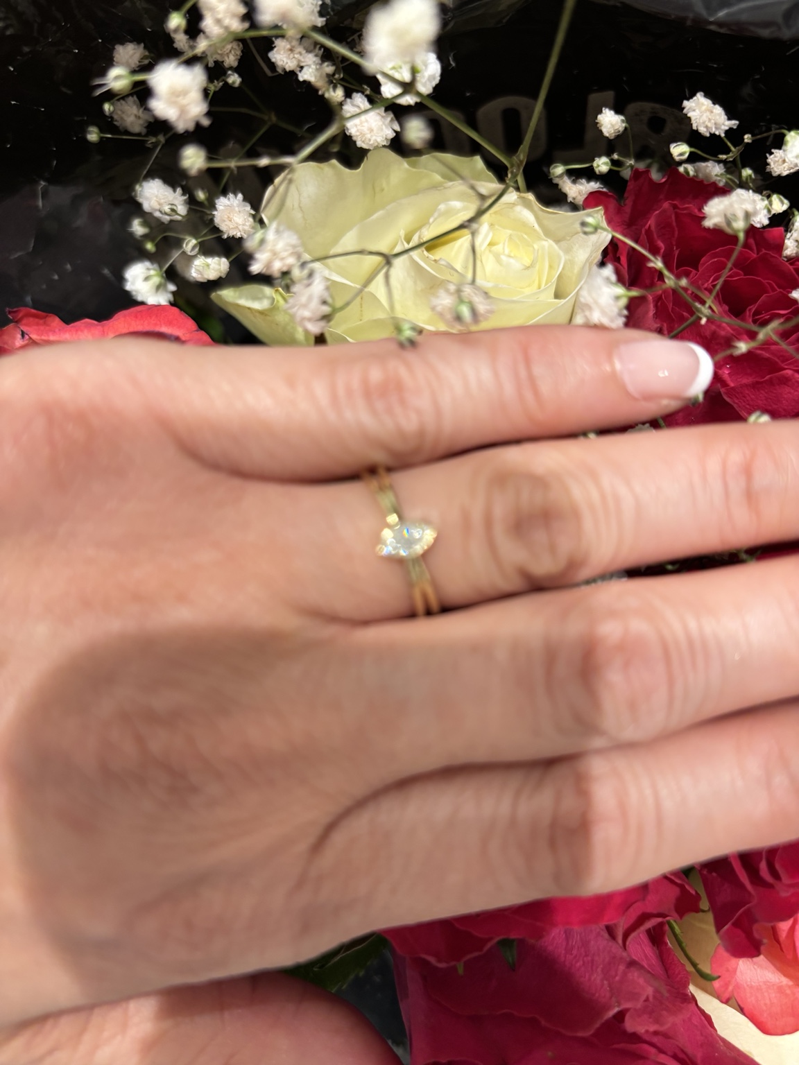 Elsbeth's engagement ring with flowers